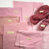 pink fabrics and yarns