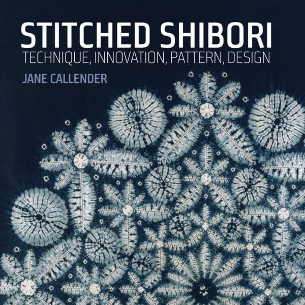 stitched shibori book cover with intricate patterns in blue and white
