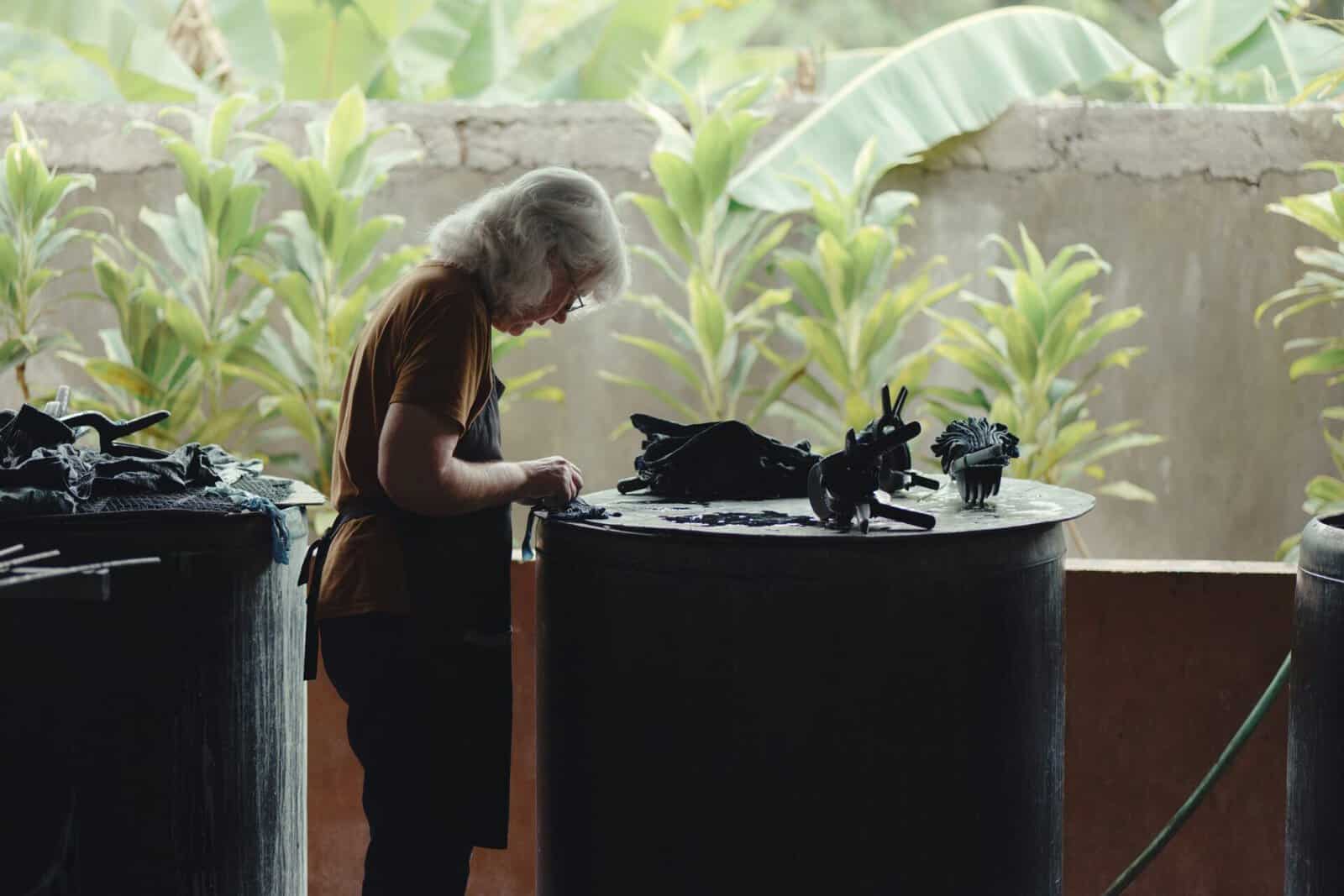 Working at the indigo vats at the Threads of Life dye studio in Bali