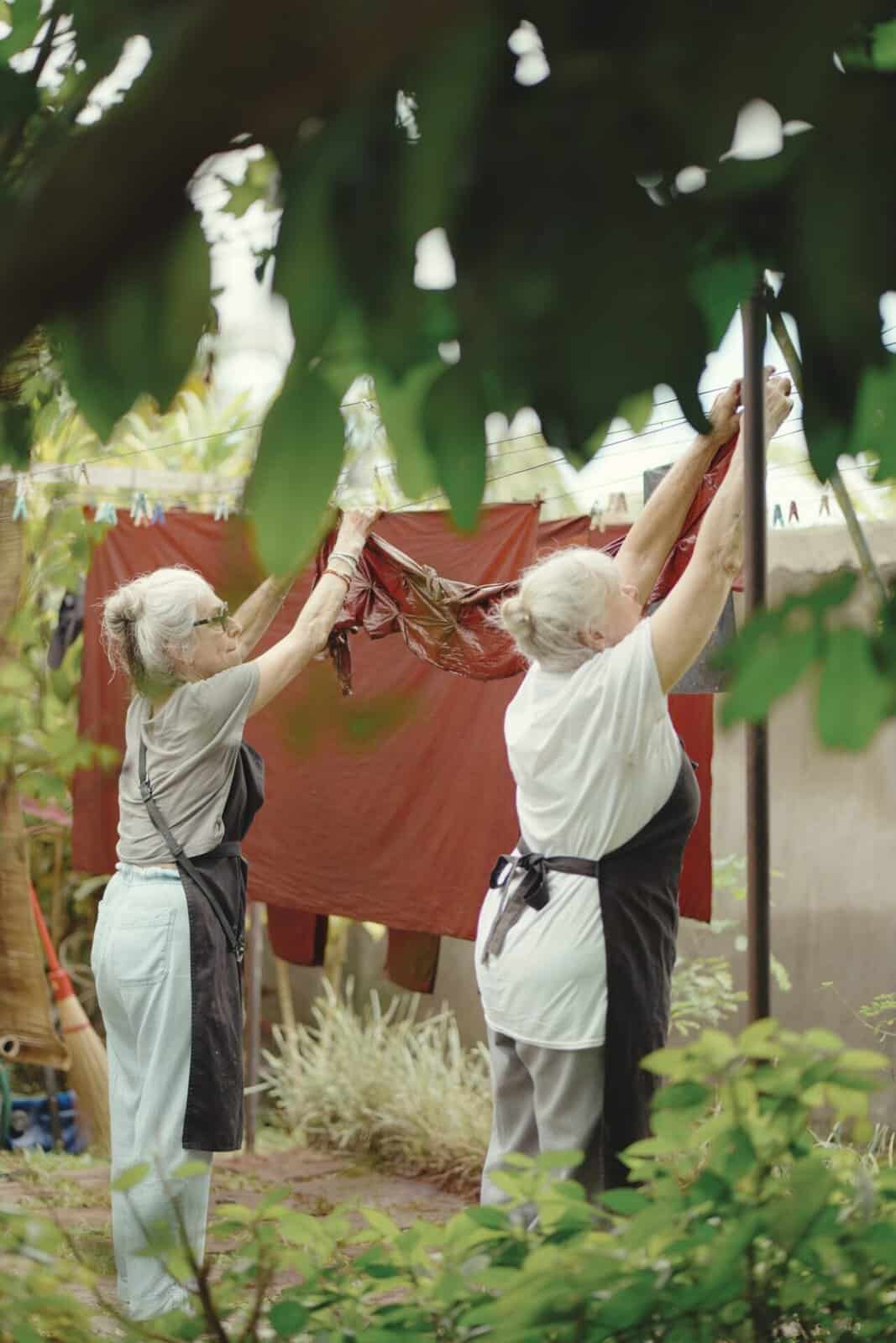 Hanging freshly dyed red cloth to dry